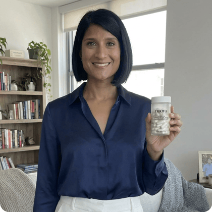 A customer holding the product